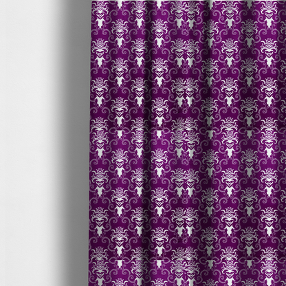The fabric used to create these made-to-measure curtains features an ornate, repeating damask pattern in white set against a rich purple background.