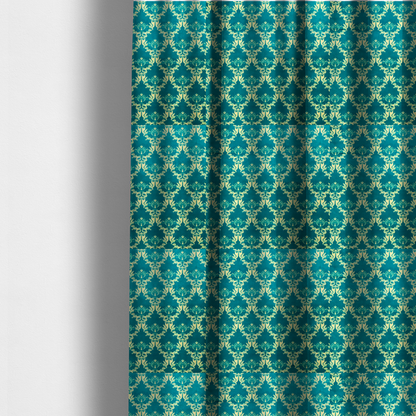 The fabric used to create these made-to-measure curtains features an intricate, repeating damask pattern in a light cream colour set against a textured teal background.   