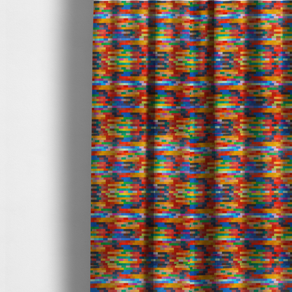 The fabric used to create these made-to-measure curtains features a colourful, mosaic-like pattern made up of small, horizontal rectangular blocks in a wide variety of bright colours, including red, orange, yellow, blue, green, and purple.   