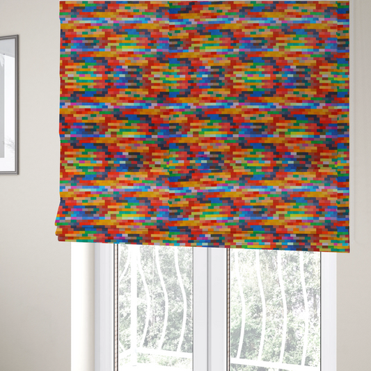 The fabric used to create these Roman blinds features a colourful, mosaic-like pattern made up of small, horizontal rectangular blocks in a wide variety of bright colours, including red, orange, yellow, blue, green, and purple.   