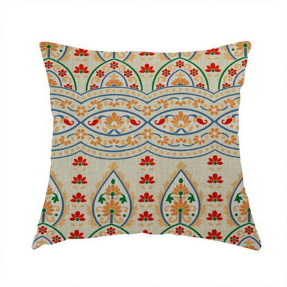 The fabric used to create this handmade cushion features an intricate, traditional-style repeating pattern set against a light, neutral background. The design incorporates teardrop-shaped paisley motifs, arched borders, and horizontal bands filled with floral details in shades of orange, blue, green, and red.   