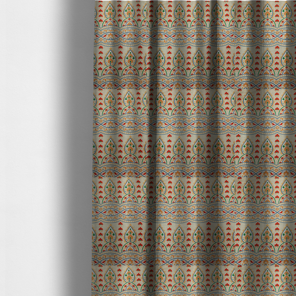 The fabric used to create these made-to-measure curtains features an intricate, traditional-style repeating pattern set against a light, neutral background. The design incorporates teardrop-shaped paisley motifs, arched borders, and horizontal bands filled with floral details in shades of orange, blue, green, and red.   