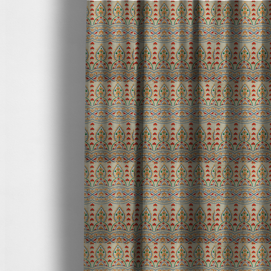 The fabric used to create these made-to-measure curtains features an intricate, traditional-style repeating pattern set against a light, neutral background. The design incorporates teardrop-shaped paisley motifs, arched borders, and horizontal bands filled with floral details in shades of orange, blue, green, and red.   