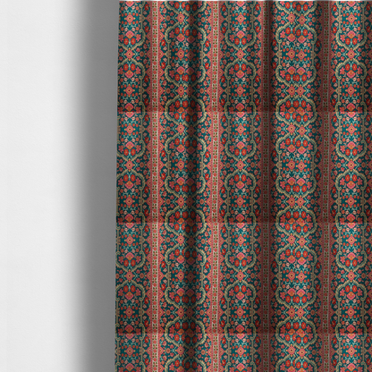 The fabric used to create these made-to-measure curtains features a vertical striped pattern filled with ornate floral and botanical motifs, set against a rich teal background. The intricate design includes scrolling vines and blossoms in shades of pink, red, and cream.