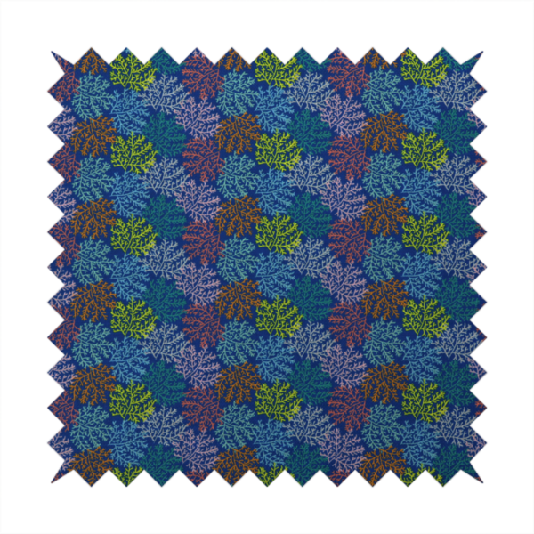 The image features an intricate, dense repeating pattern of sea coral or moss-like clusters set against a deep blue background. The design is filled with detailed organic shapes rendered in various vibrant colours, including lime green, rust orange, teal, and soft pink.