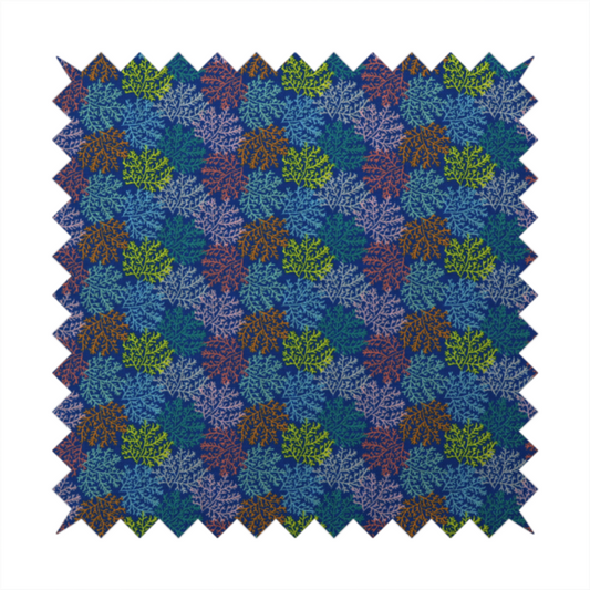 The image features an intricate, dense repeating pattern of sea coral or moss-like clusters set against a deep blue background. The design is filled with detailed organic shapes rendered in various vibrant colours, including lime green, rust orange, teal, and soft pink.