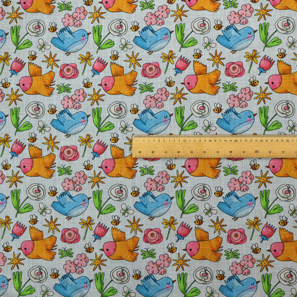The image features a playful, repeating pattern of whimsical birds, flowers, and bees set against a light background. The whimsical design includes blue and orange-yellow birds, pink and white flowers, and tiny buzzing bees.
