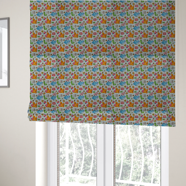 The fabric used to create these Roman blinds features a playful, repeating pattern of whimsical birds, flowers, and bees set against a light background. The whimsical design includes blue and orange-yellow birds, pink and white flowers, and tiny buzzing bees.