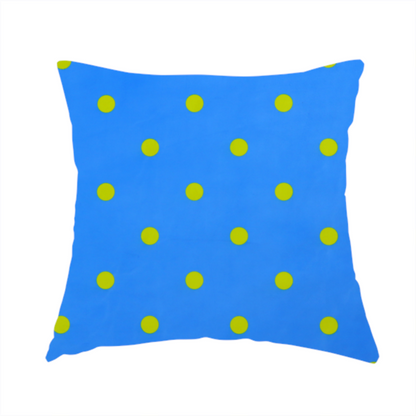 The fabric used to create this handmade cushion is a blue fabric pattern featuring evenly spaced yellow polka dots arranged in horizontal and vertical rows.