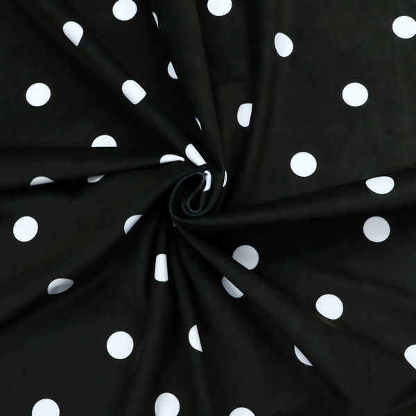 A black fabric pattern featuring evenly spaced white polka dots arranged in horizontal and vertical rows.