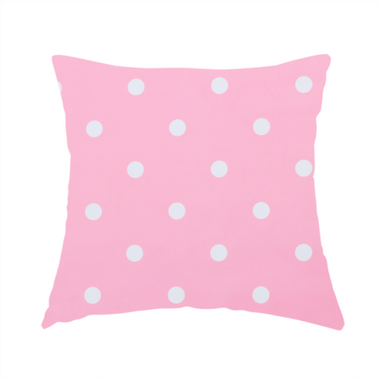 The fabric used to create this handmade cushion is a pink fabric pattern featuring evenly spaced white polka dots arranged in horizontal and vertical rows.