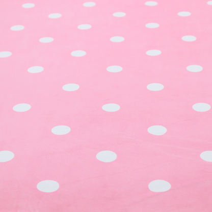 A pink fabric pattern featuring evenly spaced white polka dots arranged in horizontal and vertical rows.