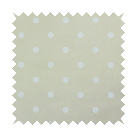 A cream or beige fabric pattern featuring evenly spaced white polka dots arranged in horizontal and vertical rows.