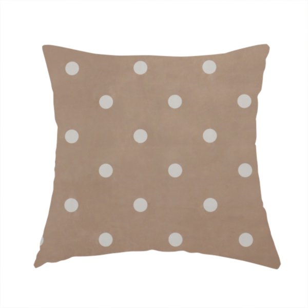 The fabric used to create this handmade cushion is a taupe or warm grey-brown fabric pattern featuring evenly spaced white polka dots arranged in horizontal and vertical rows.