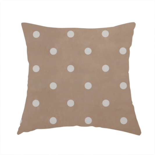 The fabric used to create this handmade cushion is a taupe or warm grey-brown fabric pattern featuring evenly spaced white polka dots arranged in horizontal and vertical rows.