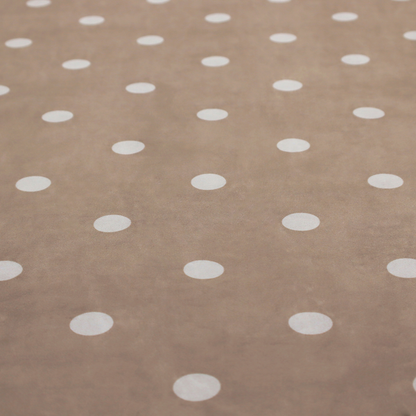 A taupe or warm grey-brown fabric pattern featuring evenly spaced white polka dots arranged in horizontal and vertical rows.