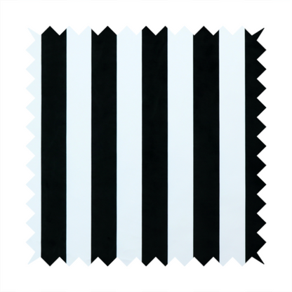 A vertically striped fabric pattern featuring alternating bands of black and white.
