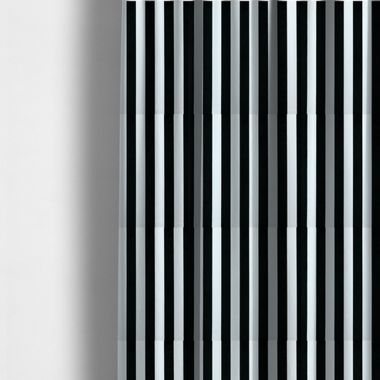 The fabric used to create these made-to-measure curtains is a vertically striped fabric pattern featuring alternating bands of black and white.