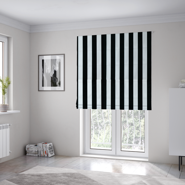 The fabric used to create these Roman blinds is a vertically striped fabric pattern featuring alternating bands of black and white.