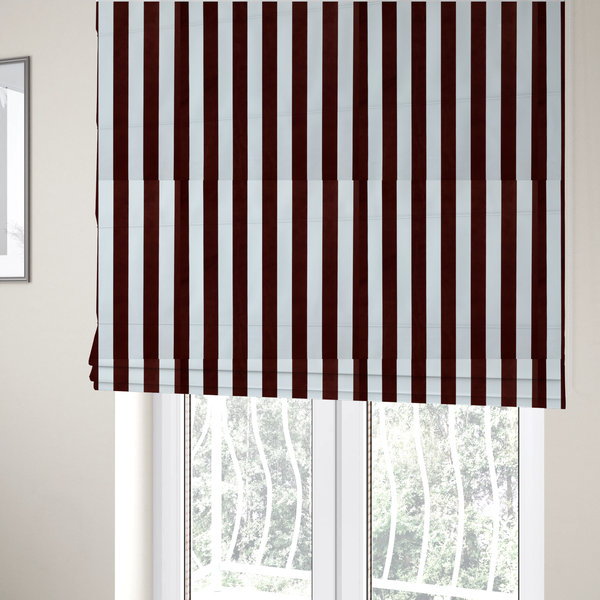 The fabric used to create these Roman blinds is a vertically striped fabric pattern featuring alternating bands of dark brown and white.