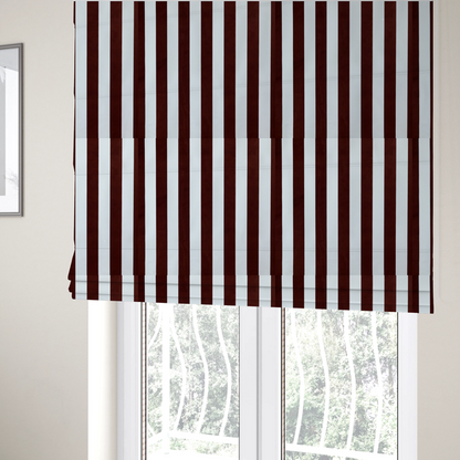 The fabric used to create these Roman blinds is a vertically striped fabric pattern featuring alternating bands of dark brown and white.