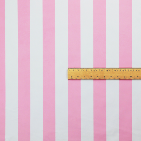 A vertically striped fabric pattern featuring alternating bands of pink and white.