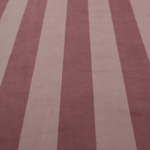 A vertically striped fabric pattern featuring alternating bands of dark dusty rose or mauve and a lighter tone.