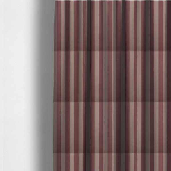 The fabric used to create these made-to-measure curtains is a vertically striped fabric pattern featuring alternating bands of dark dusty rose or mauve and a lighter tone.