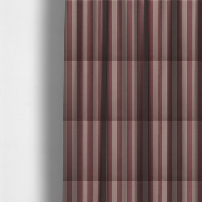 The fabric used to create these made-to-measure curtains is a vertically striped fabric pattern featuring alternating bands of dark dusty rose or mauve and a lighter tone.