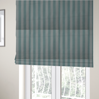 The fabric used to create these Roman blinds is a vertically striped fabric pattern featuring alternating bands of soft blue-green or teal and white.