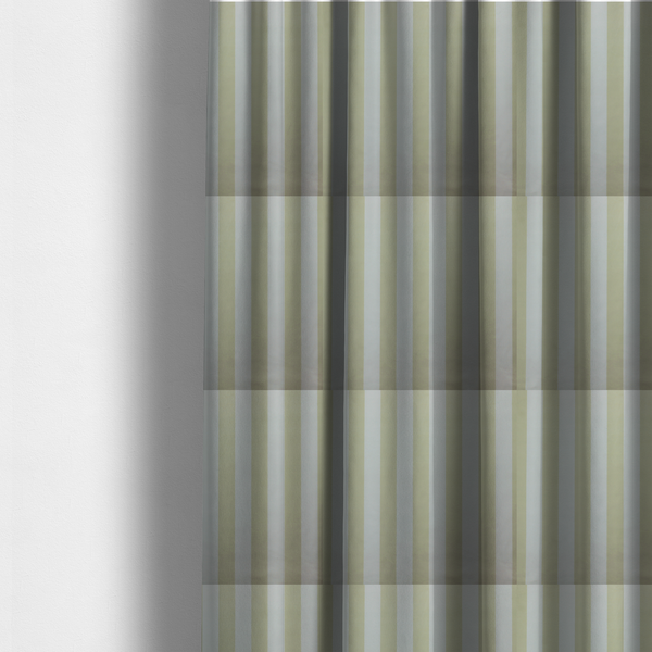 The fabric used to create these made-to-measure curtains is a vertically striped fabric pattern featuring alternating bands of soft sage green or cream and white.