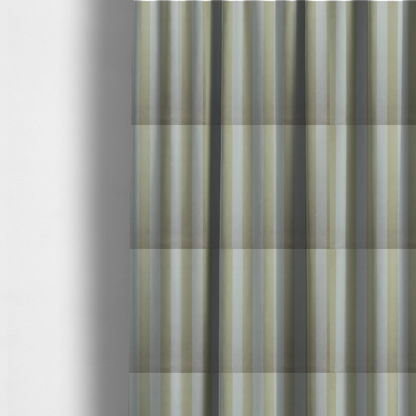 The fabric used to create these made-to-measure curtains is a vertically striped fabric pattern featuring alternating bands of soft sage green or cream and white.
