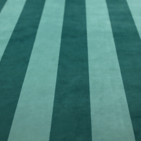 A vertically striped fabric pattern featuring alternating bands of dark teal and a lighter mint green or blue-green tone