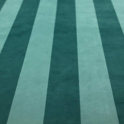 A vertically striped fabric pattern featuring alternating bands of dark teal and a lighter mint green or blue-green tone
