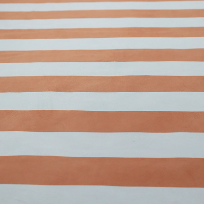 A horizontally striped fabric pattern featuring alternating bands of warm terracotta orange and white.