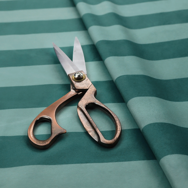 A horizontally striped fabric pattern featuring alternating bands of dark teal and a lighter mint green or blue-green tone.