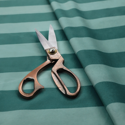 A horizontally striped fabric pattern featuring alternating bands of dark teal and a lighter mint green or blue-green tone.