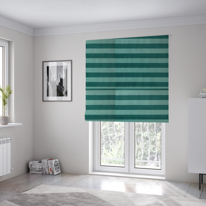 The fabric used to create these Roman blinds is a horizontally striped fabric pattern featuring alternating bands of dark teal and a lighter mint green or blue-green tone.
