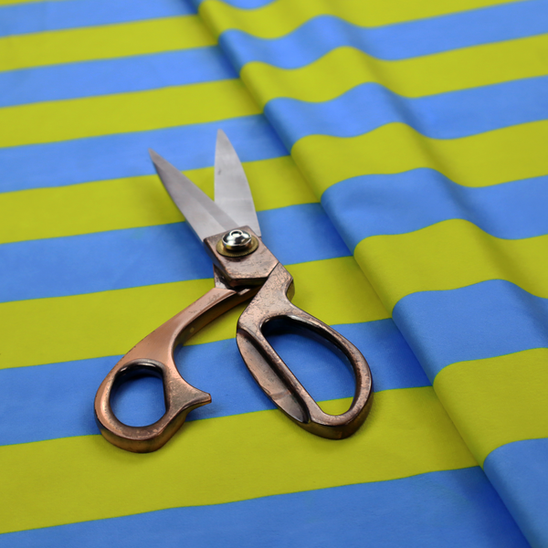 A horizontally striped fabric pattern featuring alternating bands of bright electric blue and yellow-green or lime.