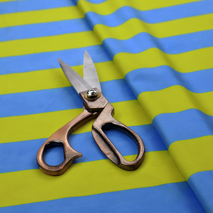 A horizontally striped fabric pattern featuring alternating bands of bright electric blue and yellow-green or lime.
