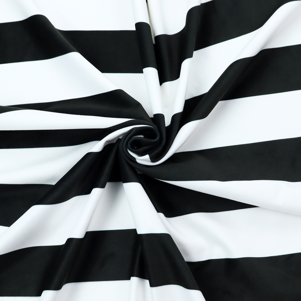 A horizontally striped fabric pattern featuring alternating bands of dark black and white.   