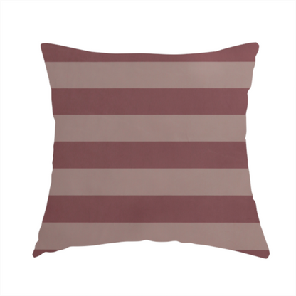 The fabric used to create this handmade cushion is a horizontally striped fabric pattern featuring alternating bands of muted dusty pink and a lighter mauve or rose tone.