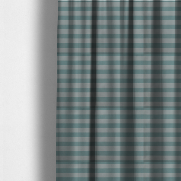 The fabric used to create these made-to-measure curtains is a horizontally striped fabric pattern featuring alternating bands of soft duck egg blue and white.