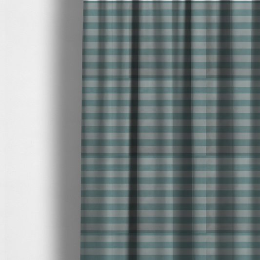 The fabric used to create these made-to-measure curtains is a horizontally striped fabric pattern featuring alternating bands of soft duck egg blue and white.