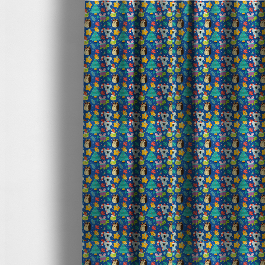 The fabric used to create these made-to-measure curtains is a repeating festive Christmas print on a royal blue background featuring cute cartoon holiday characters, including koalas wearing Santa hats, hedgehogs with antlers, giraffes, Christmas trees, wrapped presents, and stars.   