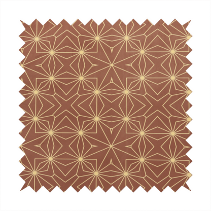 A geometric upholstery fabric featuring an intricate, repeating starburst and lattice pattern in cream lines on a warm terracotta brown background.   