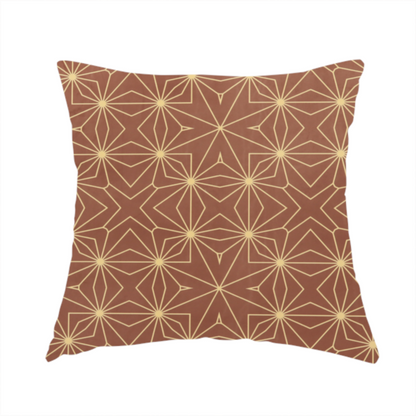 The fabric used to create this handmade cushion is a geometric upholstery fabric featuring an intricate, repeating starburst and lattice pattern in cream lines on a warm terracotta brown background.   