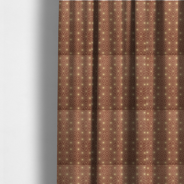 The fabric used to create these made-to-measure curtains is a geometric upholstery fabric featuring an intricate, repeating starburst and lattice pattern in cream lines on a warm terracotta brown background.   