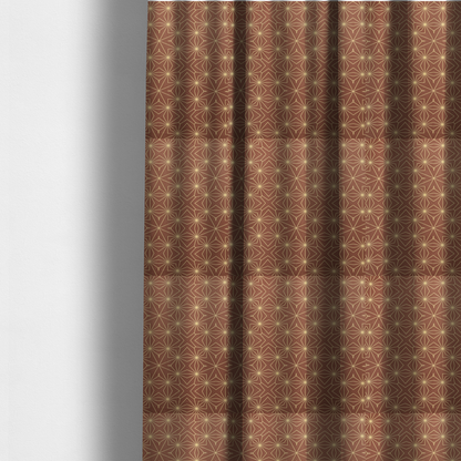The fabric used to create these made-to-measure curtains is a geometric upholstery fabric featuring an intricate, repeating starburst and lattice pattern in cream lines on a warm terracotta brown background.   