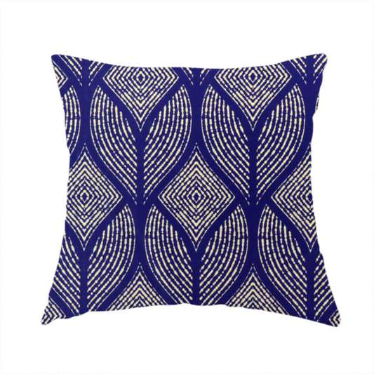 The fabric used to create this handmade cushion is a geometric upholstery fabric featuring an elegant, symmetrical pattern of interlocking diamond shapes and stylized, dotted leaf arches in cream on a royal blue background.   
